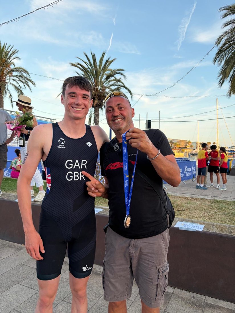 Michael Gar celebrating with his European Championships silver medal in Tarragona